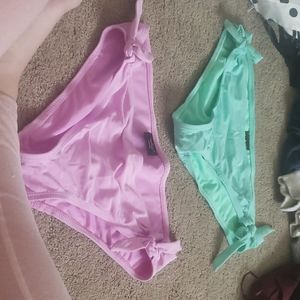 2 pairs of bikini bottoms size medium